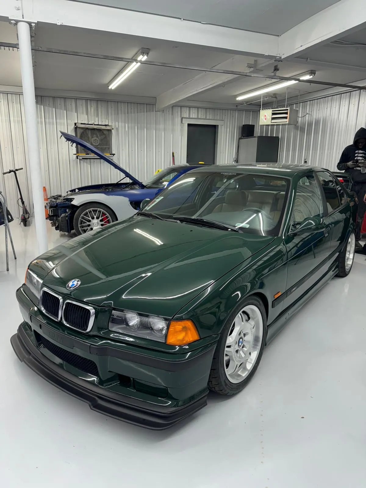 Pristine E36 M3 in British Racing Green with factory styling. Full paint correction and detail.