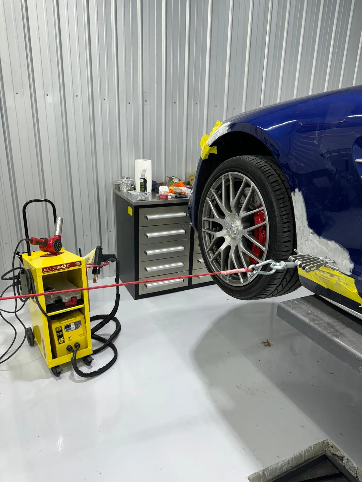 Aluminum fender pull using ALUSPOT equipment on the AMG GT. Precision structural straightening.
