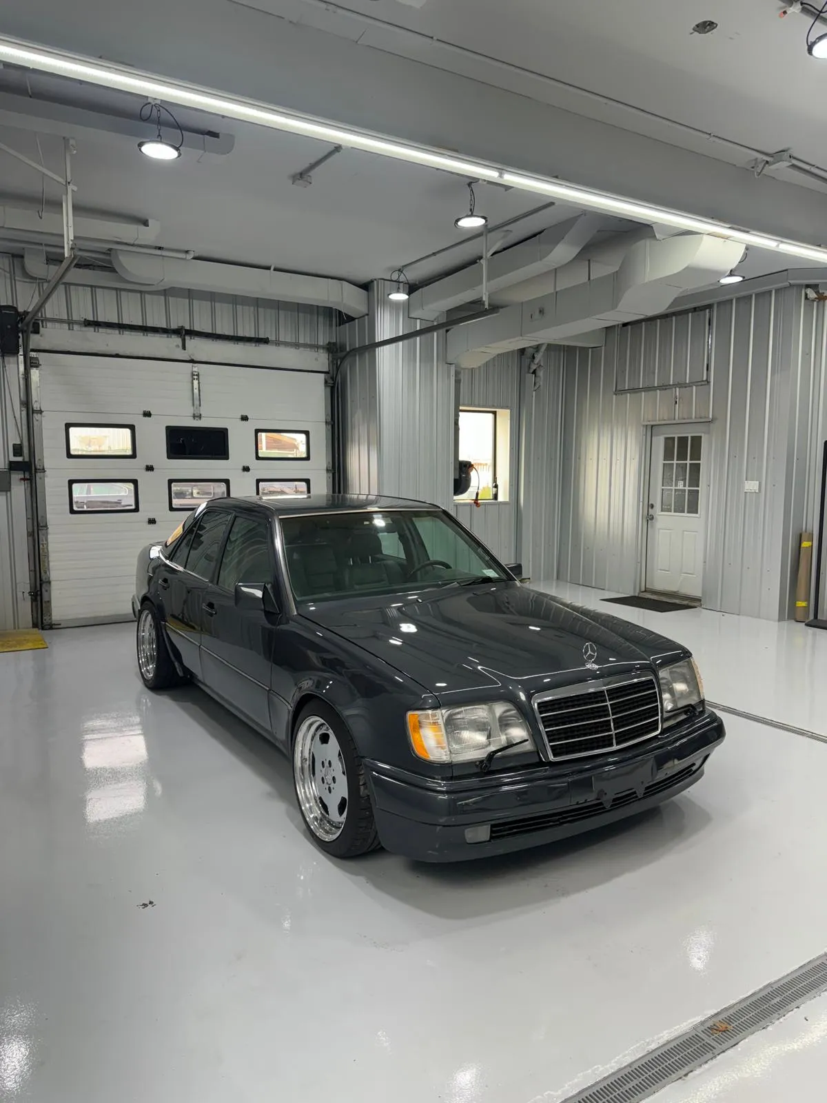 Classic W124 E500 with deep paint correction and full detail. Timeless design preserved.